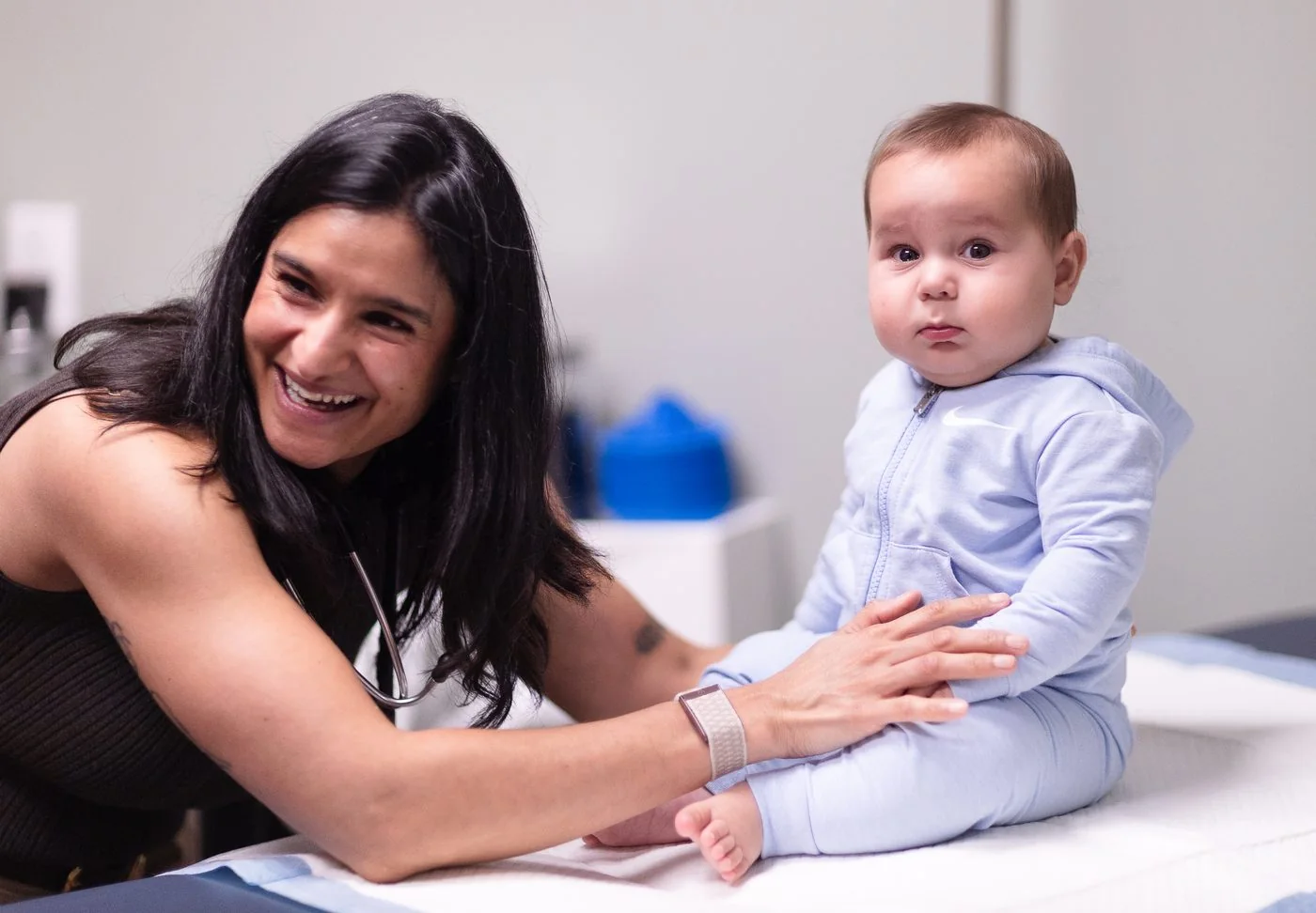 Vitality Functional Family Medicine physician checking in with a young patient