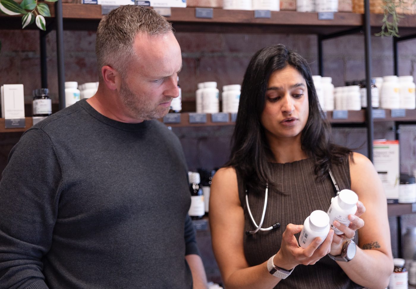 Vitality Functional Family Medicine physician reviewing thyroid supplements with a patient