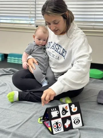 Vitality Pelvic Health therapist consulting with a family about pediatric pelvic health