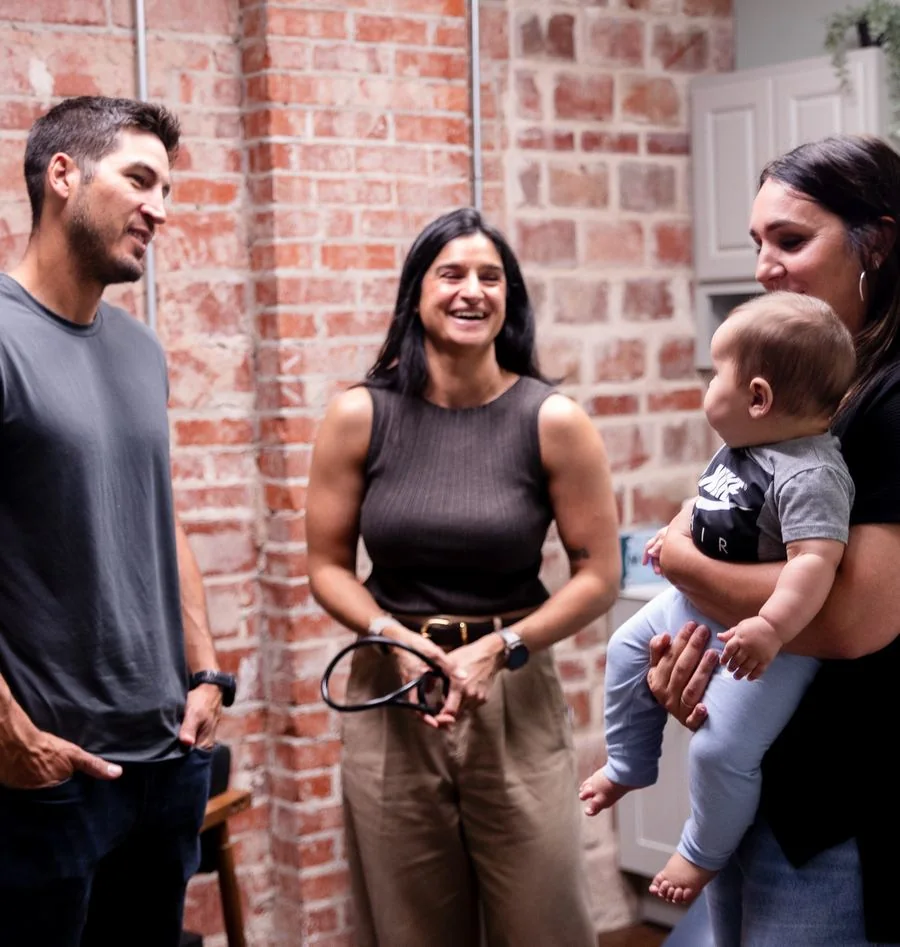 Vitality Functional Family Medicine physician discussing gut health symptoms with a patient
