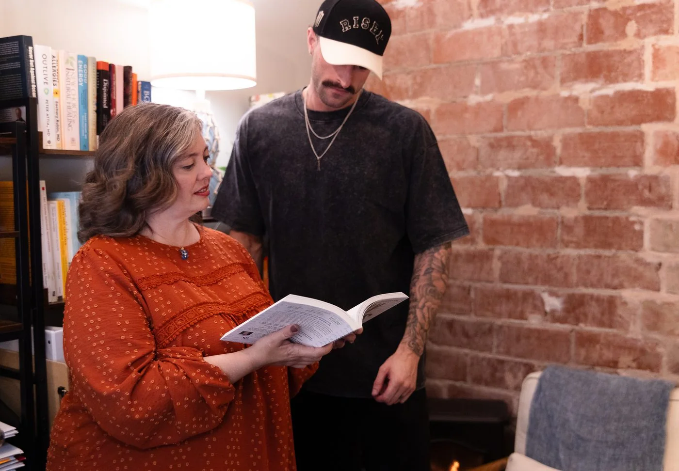 Vitality Functional Family Medicine clinician reviewing a resource with a patient